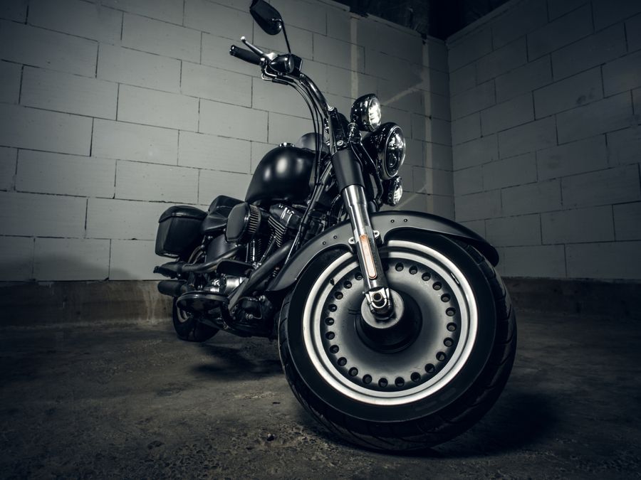 Motorcycle parked in a dark garage